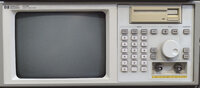 Front panel of the HP 1653 B logic analyzer that is characteristically controlled from only a single rotary knob combing with simple buttons.